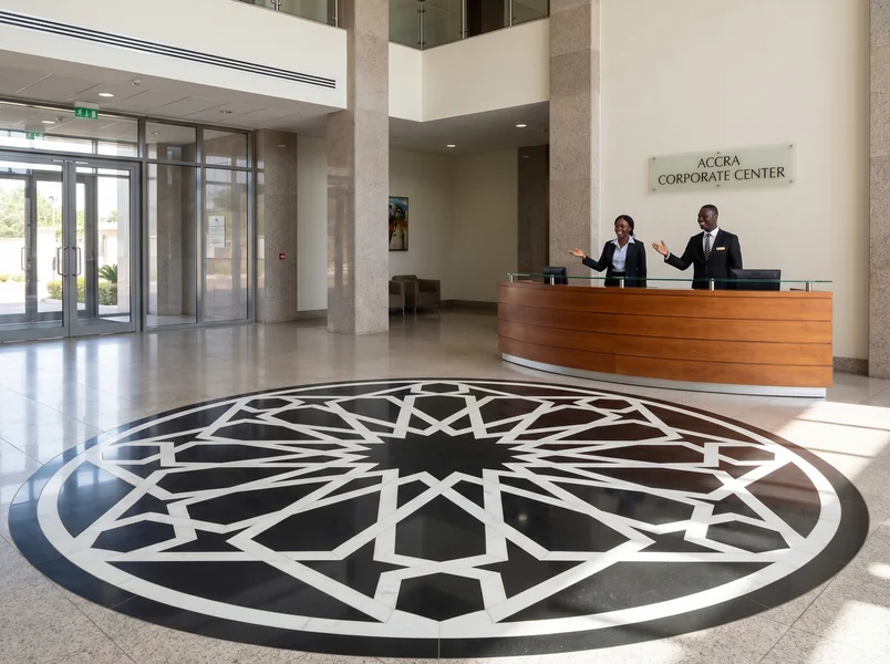 Custom waterjet marble medallion in a corporate reception floor in Accra, Ghana